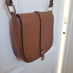100% leather saddle bag